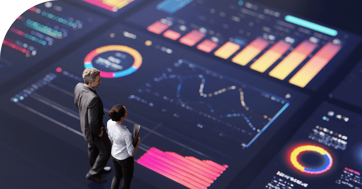 Image of two people viewing digital advertising data.